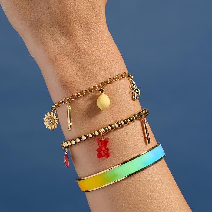 Crayola X Alex & Ani collection. Three bracelets, stretch, charm and cuff.