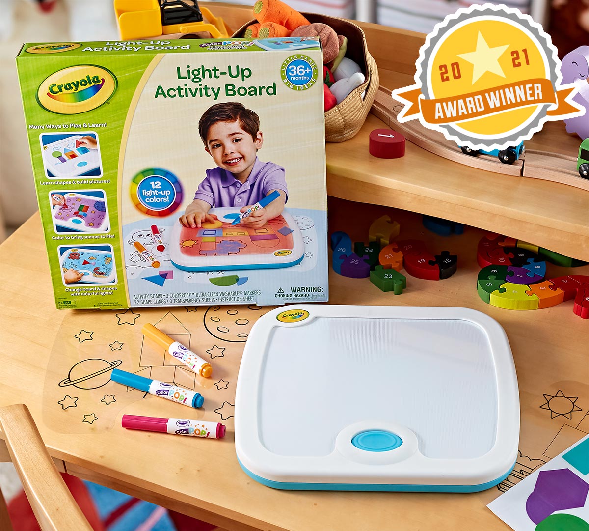 Light Up Activity Board. 2021 award winner.  Contents and front of packaging.